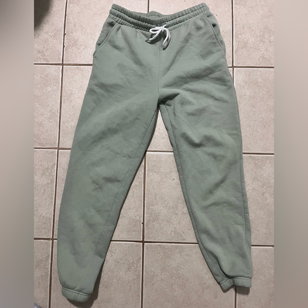 Green sweatpants